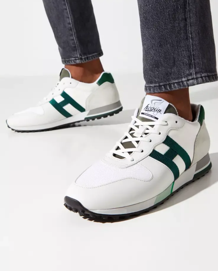 Beżowe sneakersy z zielonym logo