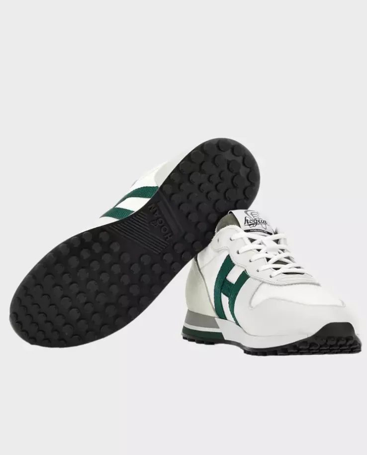 Beżowe sneakersy z zielonym logo