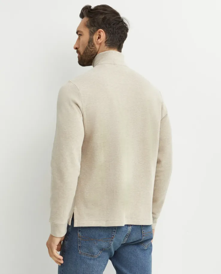 Beżowy sweter z suwakiem i logo