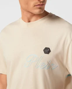 Beżowy t-shirt z logo