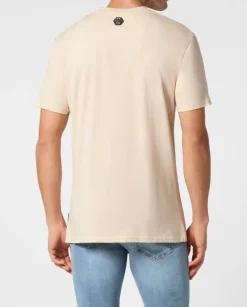 Beżowy t-shirt ze zdobieniem