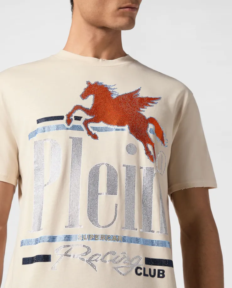 Beżowy t-shirt ze zdobieniem