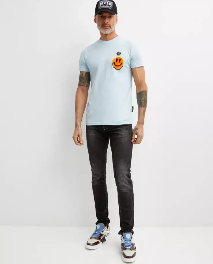 Błękitny t-shirt z naszywką Smile