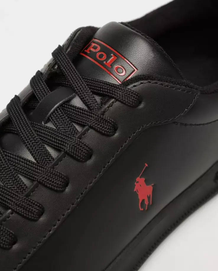 Czarne sneakersy z czerwonym logo